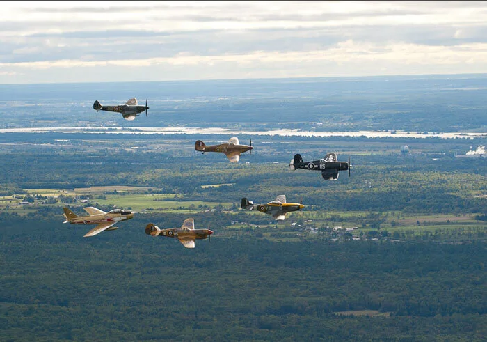 Kissmann, in the Corsair, leads the formation across the Ottawa Valley. Photo: Peter Handley