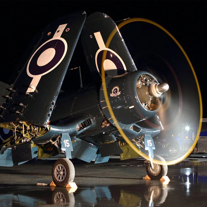 The crowd was very pleased when Kissmann folded the wings to give yet another rare view of the Corsair at night. The Vintage Wings Corsair wears the Gray Ghost One badge on her cowling. Photo: Parr Yonemoto