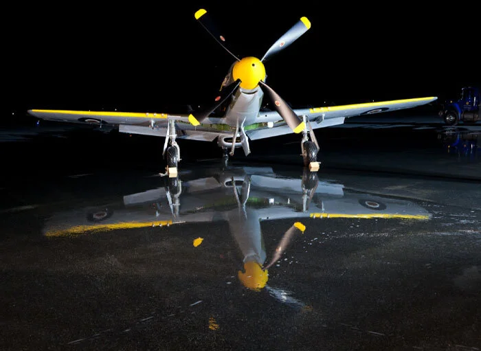 The stunning effect of a wet ramp is evident in this shot, with a perfect reflection of the 442 Squadron Mustang just minutes before start-up. In a similar fashion, often model aircraft builders will arrange their scale aircraft on a mirror so that viewers can see the work they have done on the underside of the model. Thanks again go to the firefighters of the City of Gatineau. Photo: Richard Allnutt