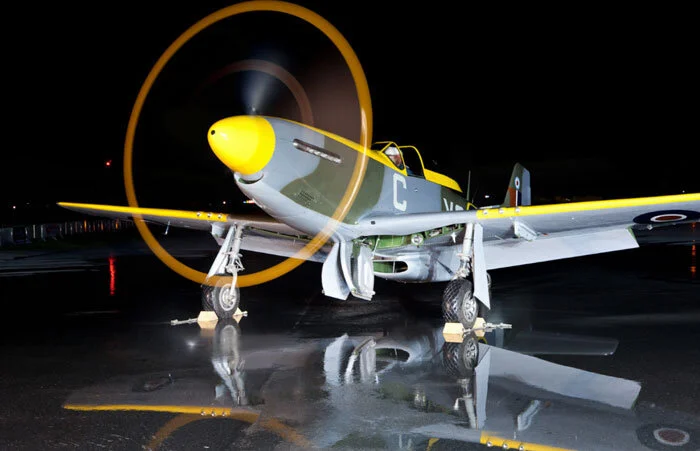 The Vintage Wings of Canada Mustang is painted in the markings of 442 Squadron. As part of the “In His Name” dedication program, it will soon to be dedicated to Les Frères Robillard - Larry and Rocky. Actually born Laurent et Rolland, these two native-of-Ottawa brothers would make their mark on RCAF history. Larry was a Spitfire pilot and ace, while Rocky was a Mustang pilot who often flew Mustang Y2-C (KH66 - the same markngs as the VWC Mustang). Photo: Richard Mallory Allnutt.