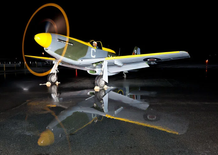 Again, we see the formation of a vortex near the base of the prop's arc.The stunning liquid reflection of the underside of the Mustang is perfect. Photo: Richard Mallory Allnutt