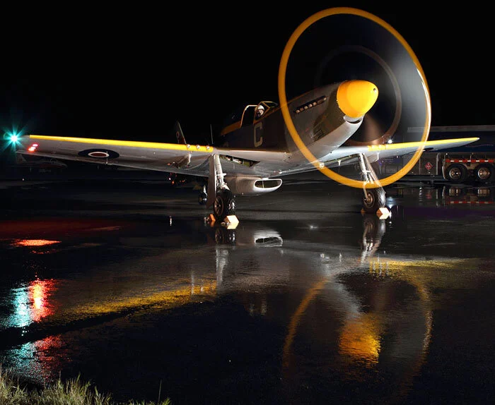 Pilot John Aitken, closes the gear doors and retracts the flaps. Photo: Parr Yonemoto