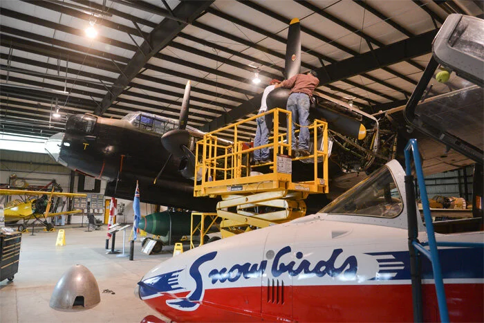 At Nanton, the Merlin engine crew work on the Lanc’s port inner engine to get her ready for the big debut. Photo: Bomber Command Museum of Canada; Doug Bowman