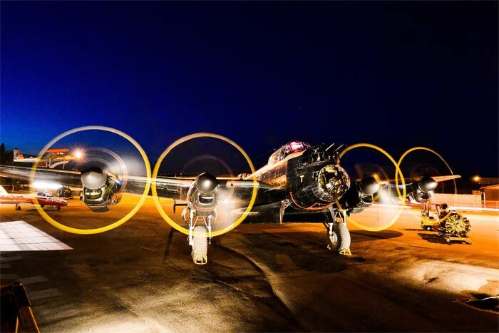 The end result will be a photo that everyone will comment on... a full colour “painting” of a Lancaster warming up for a night mission over Germany. Photo: Bomber Command Museum of Canada; Doug Bowman