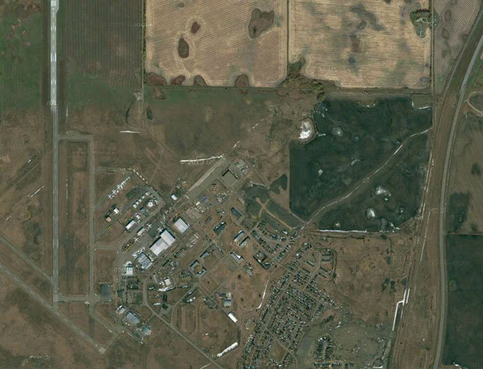 The Penhold airfield still functions today, more than most former BCATP bases in the West, but many of the hangars are now demolished or destroyed by fire and only 2 of the original six runways still accept aircraft. Image via Google Maps