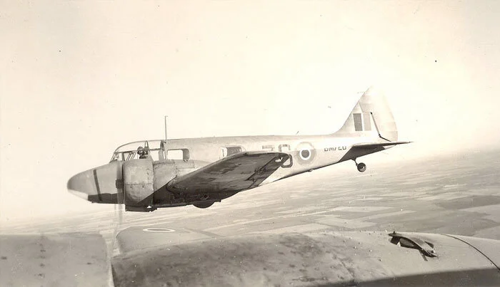 During the Second World War, the service flying students at No. 36 SFTS were instructed on the Airspeed Oxford twin-engined trainer. The Airspeed AS.10 Oxford was used for training British Commonwealth aircrews in navigation, radio-operating, bombing and gunnery during the Second World War. They were all built in Great Britain and were shipped to Canada for the use of RAF students. This and the following vintage photographs were taken by Royal Australian Air Force pilot F/O Ray Morgan in 1944. In this shot, Morgan, in the co-pilot’s seat, photographs another Oxford over the engine nacelle of his, with the Alberta prairie below. Photo: F/O Ray Morgan, via Nektonic at Flickr