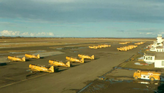 Post war, Penhold became a major training base for RCAF pilots. After initial training on the de Havilland Chipmunk, fledging pilots would advance to the more challenging Harvard 4, before going on to the T-33 Silver Star to earn their wings. Here is a great photograph of the Penhold flight line in the early 1960s with scores of Harvards awaiting their students and instructors.