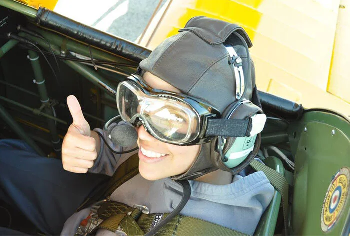 Belted in and ready for flight—16-year-old Maria Higuerey, originally from Venezuela but now an air cadet in Fort McMurray, Alberta gives us the thumbs up before her flight back in time. Afterward, Higuerey had an even bigger smile, saying, “My experience with Vintage Wings was amazing and inspiring. I am really glad to have the opportunity to fly in one of the aircraft with such an interesting and amazing history. The best part of my experience was flying the aircraft myself. Being chosen was a privilege and I am truly happy to have been part of the ride. The Canadian Air Cadet Program sparked a personal passion for flying. After finishing High School and Cadets, I am planning to go to University to study aerospace engineering and I would also like to join the military. I thank Vintage Wings for making my summer the best summer I have ever had so far and also for giving me a memory that I will definitely preserve forever. I would also like to thank the Canadian Cadet program for giving me this and many other opportunities and making my dreams come true.” You’re welcome Corporal Higuerey! Photo: Yellow Wings Stearman Team