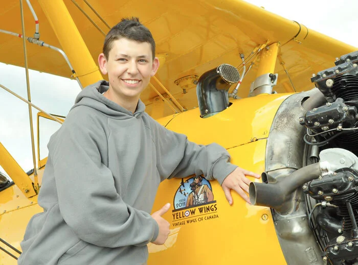 Logan Praznik, a third-year Air Cadet with the rank of Flight Corporal, from 82 “Brandon” RCACS, offers us and our sponsors a unique perspective on his experience: “If I was approached by one of Vintage Wings’ sponsors, I would tell them, ‘Aviation, in many ways, is the cutting edge of many fields in one final product. Thank you, not only for letting me see what the cutting edge was 70 years ago, but also how we’ve improved now, and where we might go in the future.’ ” Photo: Yellow Wings Stearman Team