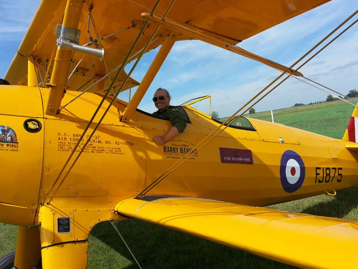 Cadet Officer Becca Howard plays the part of the young Bowden rigger who sat in FJ875, 70 years ago. Photo: Yellow Wings Stearman Team