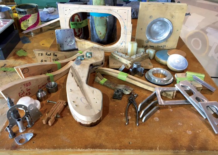 The multi-dimensional complexities of building a Spitfire in the Castle Bromwich factory during the Second World War were overcome by jigs, custom tools, forms, molds, templates and thousands of employees. To build Spitfire wings, controls and fusela