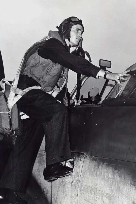 Rocky Robillard stepping into the cockpit of a Hawker Hurricane 