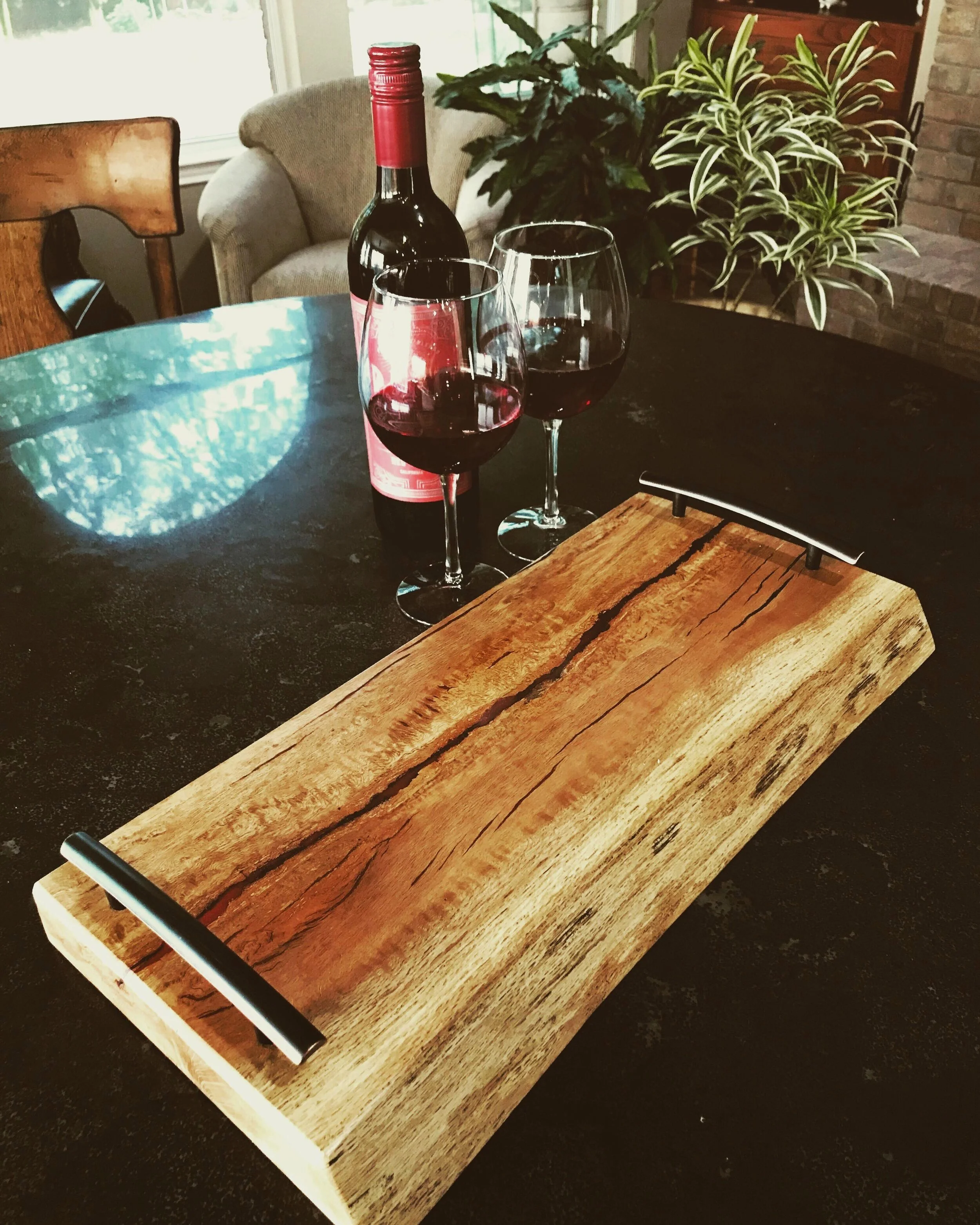-20in x 10in -$135 -Pecan
-It’s a true pleasure to find grain patterns that emulate other patterns in nature. In this piece we saw what looked to be a rock formation, then burned a few small trees atop it to paint the picture of a landscape. The boar