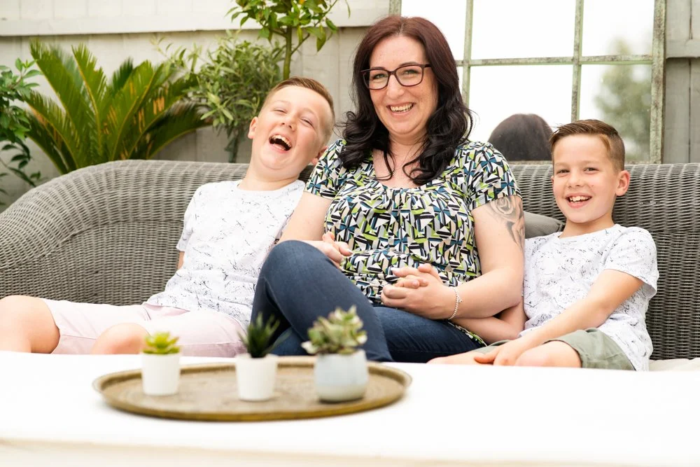 Woman laughing with her two children