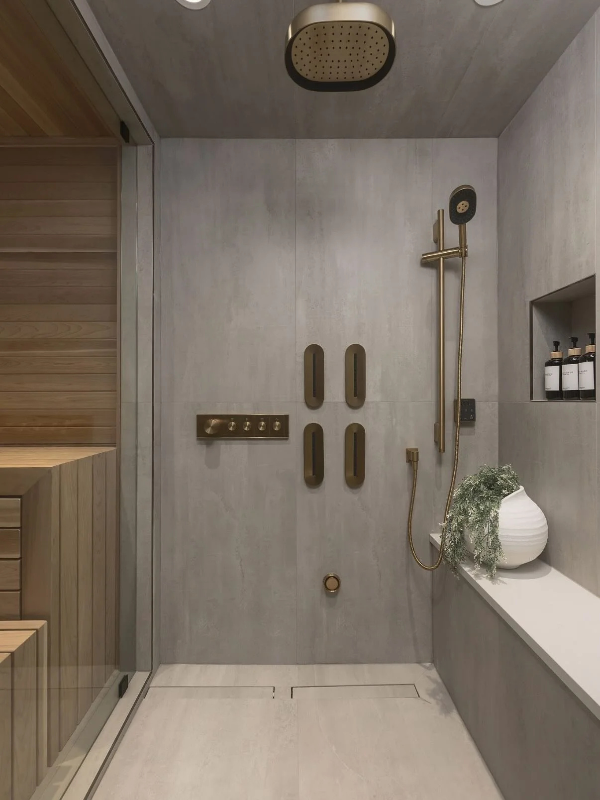 ✨ Welcome to spa-like serenity at home ✨
We designed this luxe wellness retreat featuring the Kohler Statement series&mdash;where performance meets beauty in every drop. From the warm cedar tones of the sauna to the clean lines of the custom steam sh