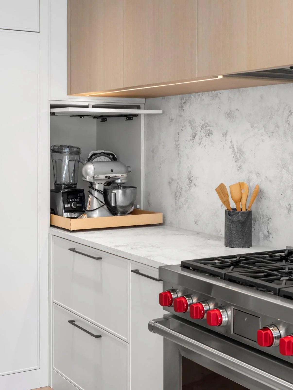 Everything has a place&mdash;and it shows. ✨
In this family kitchen, we tucked a full appliance garage seamlessly into the cabinetry to keep everyday essentials close, but completely out of sight. From the stand mixer to the blender, it all disappear
