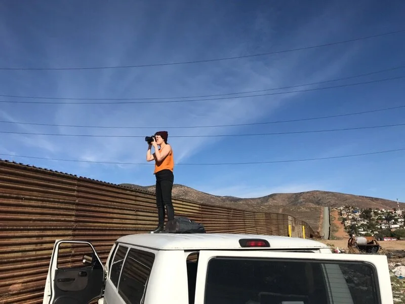 Standing on our van, photographing Trump’s prototype border wall panels.