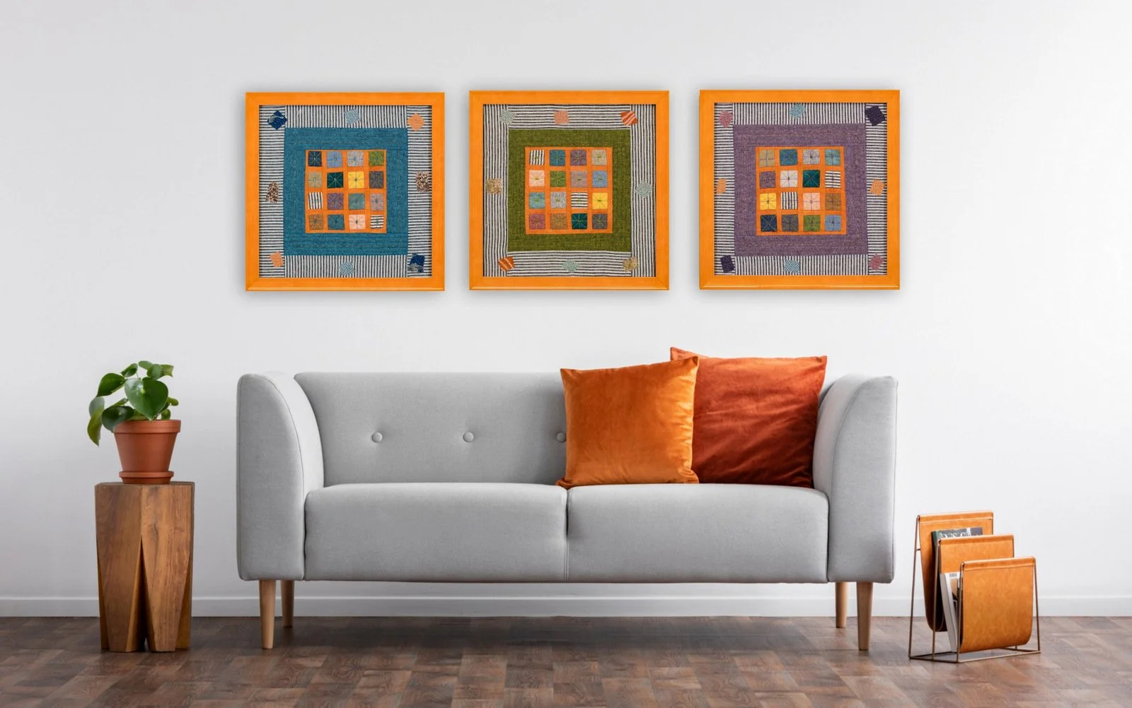 Series of three geometric art quilts, in green blue and purple with orange frames, by Elizabeth Garlington. of Waynesville, NC