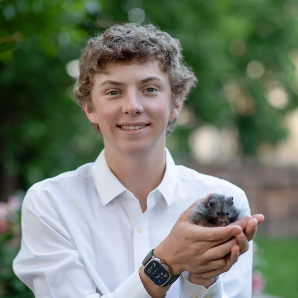 Copland LaBerge, GHR founder, holding a hamster