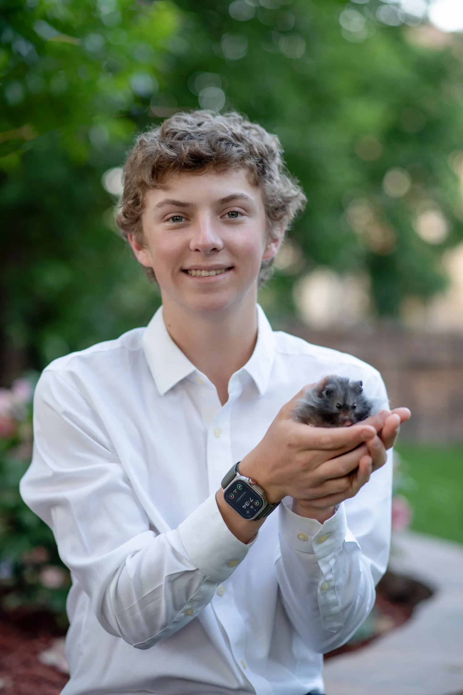 GHR founder Copland LaBerge holding a hamster