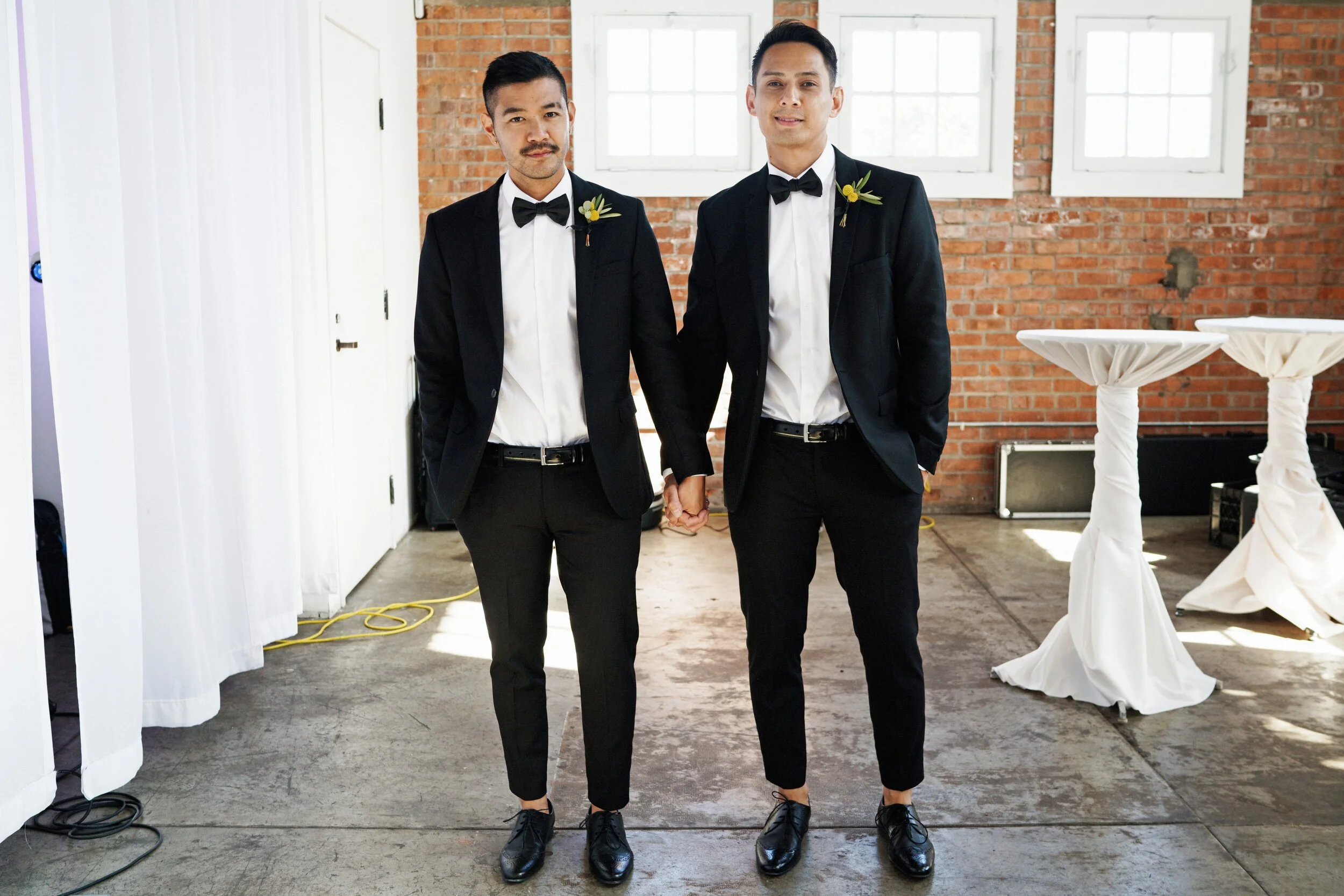 two-men-in-wedding-attire-suits-CVDBQ86.jpg