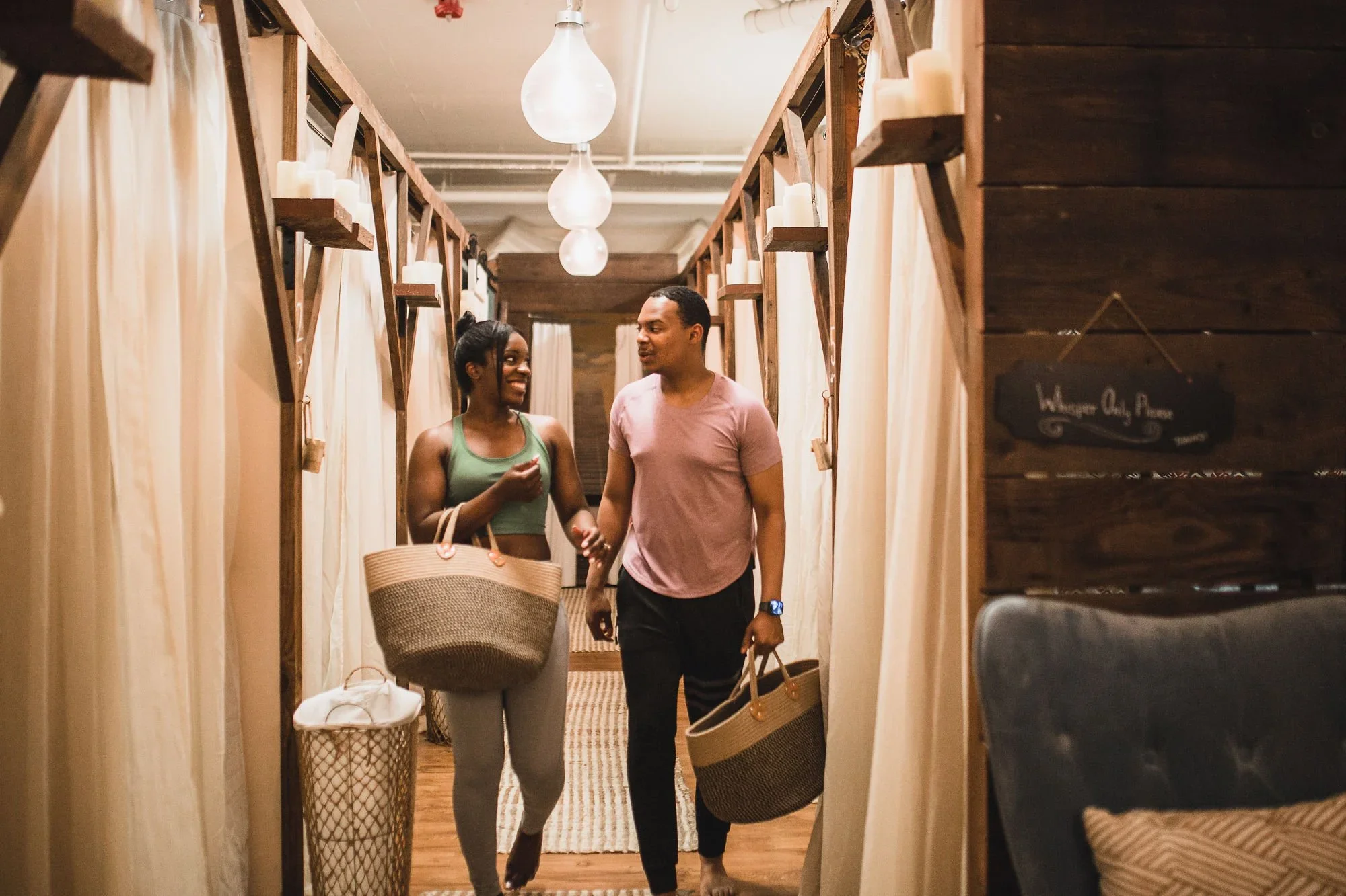 Clients walking through City Sweats after a guided wellness coaching experience focused on recovery and sustainable self-care.