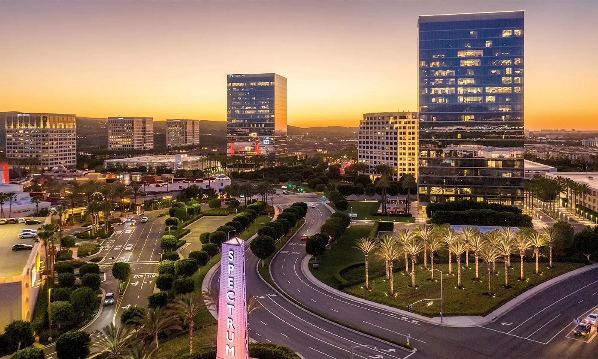 Irvine California cityscape at sunset, highlighting a thriving and health focused market for wellness franchise opportunities.