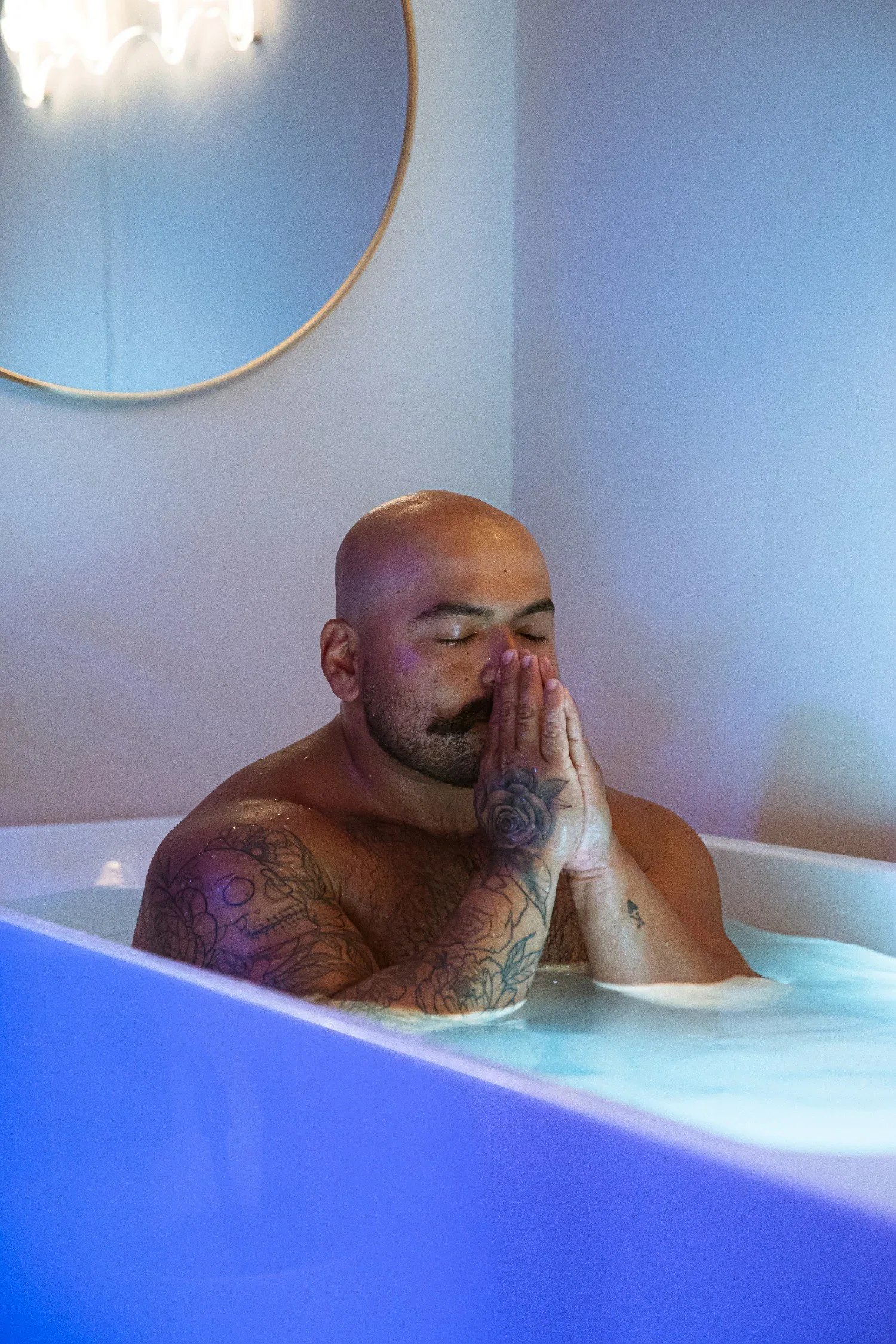 Fire service veteran practicing contrast therapy with ice bath and sauna to support nervous system recovery and healing.