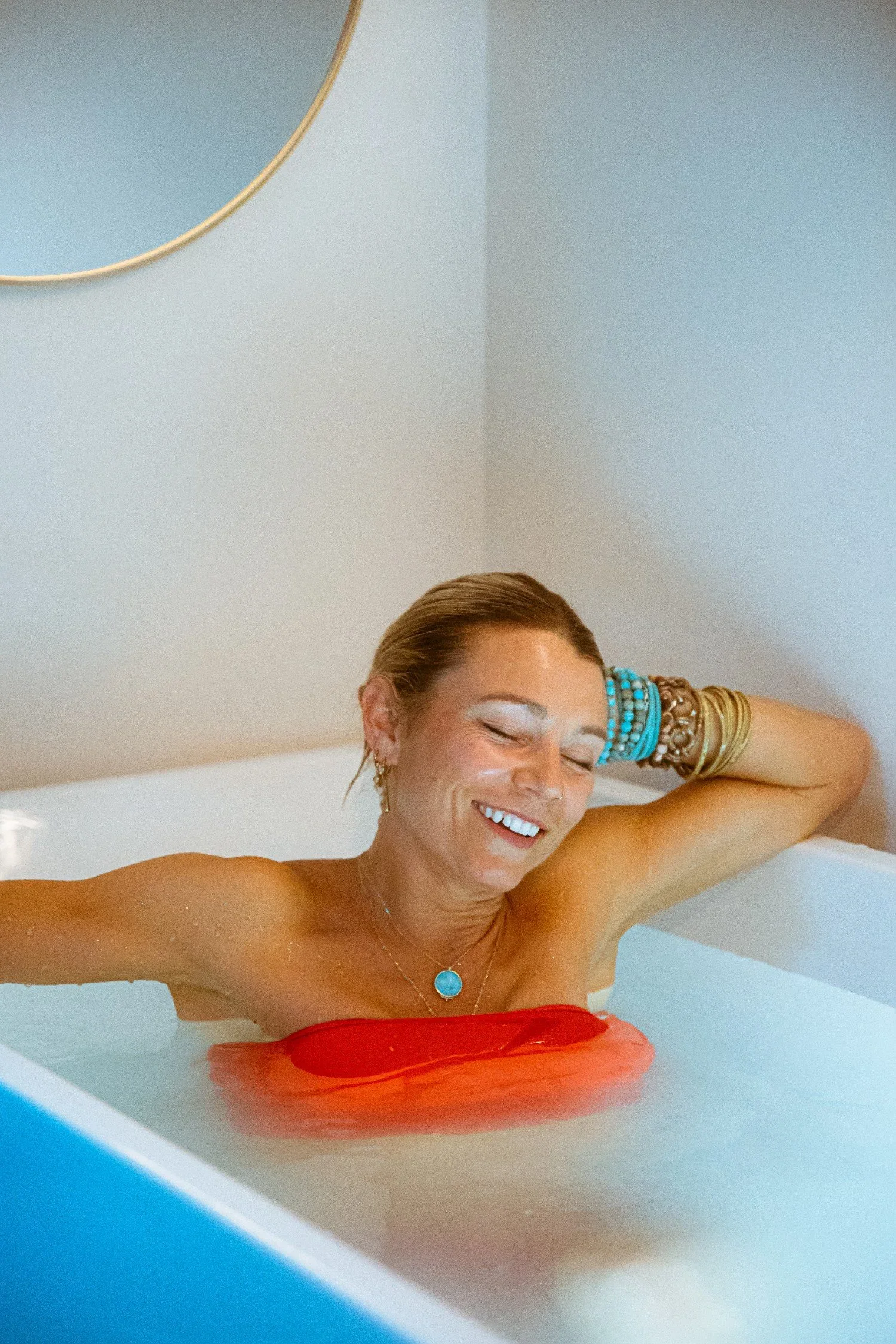 Client enjoying a cold plunge recovery session at a City Sweats wellness franchise in California.