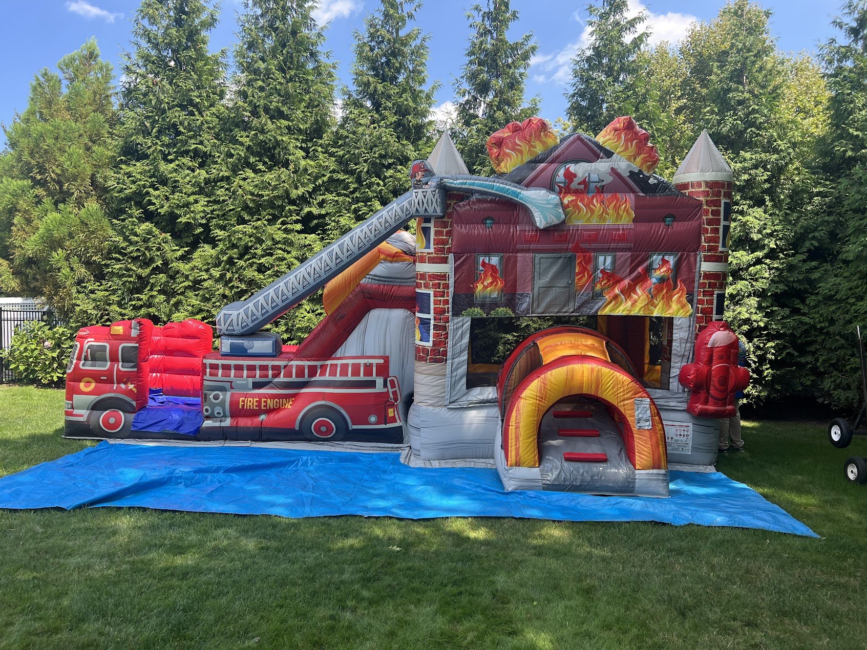house & fire truck rescue bounce house.jpg