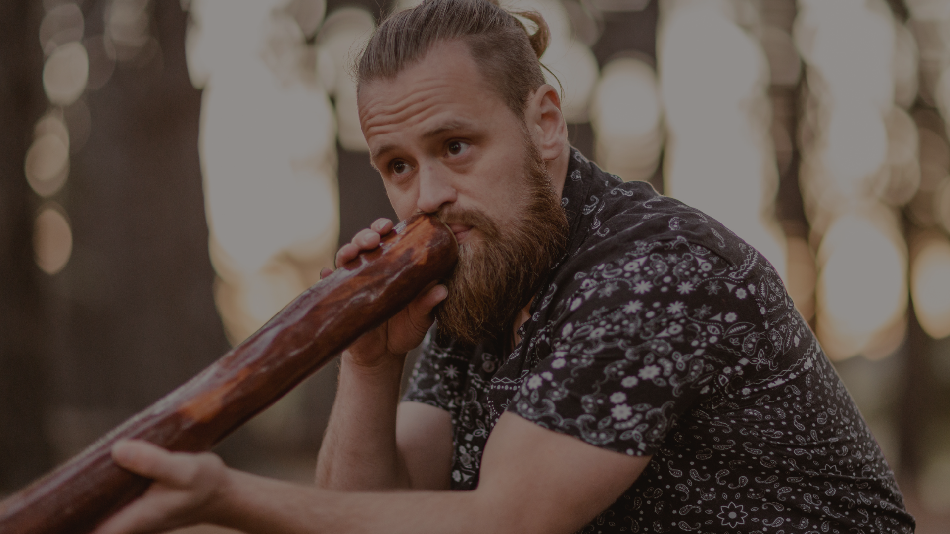 Liam Miko guiding breathwork and sound healing at a trauma-aware embodied retreat in New Zealand