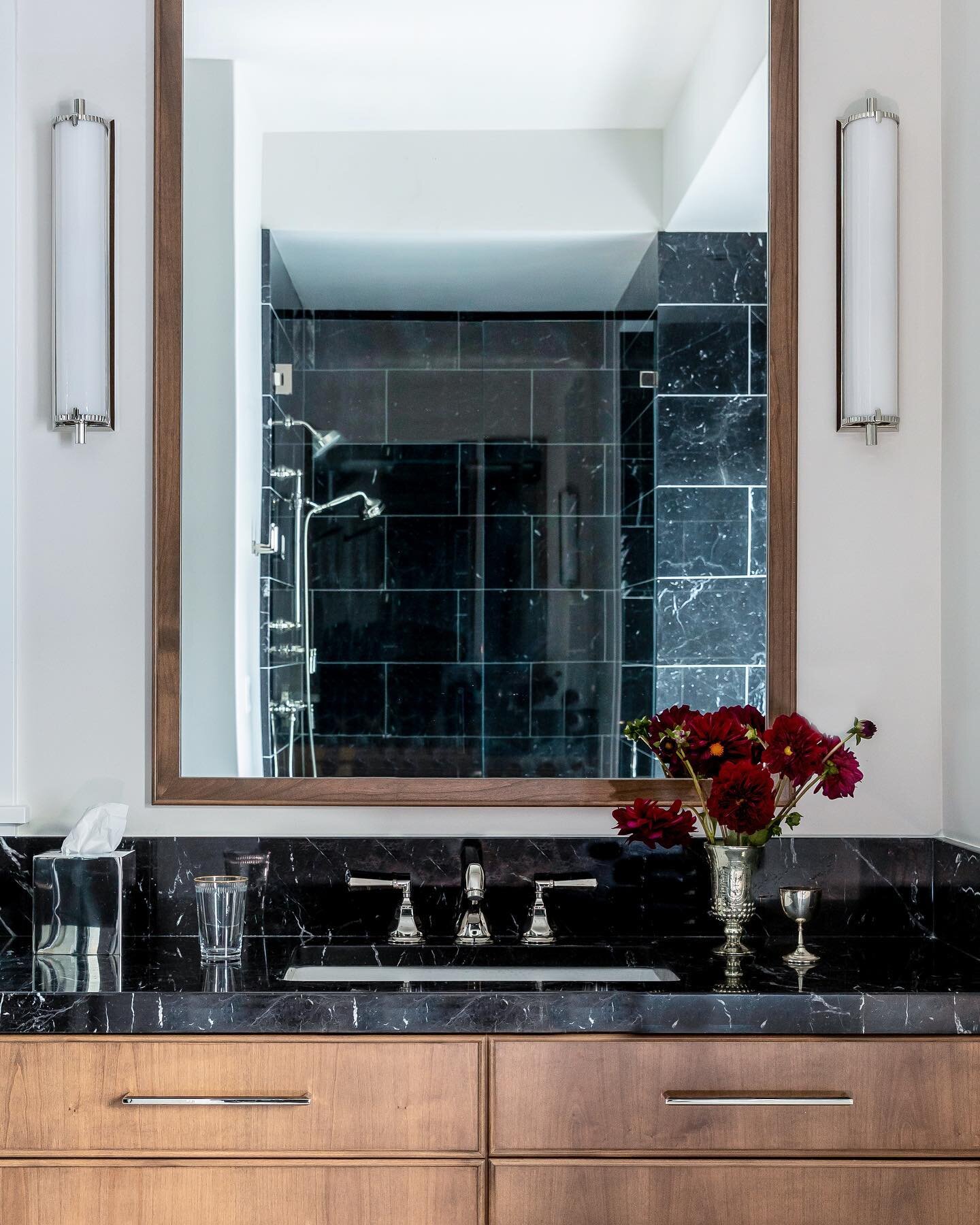 We&rsquo;re in love with the elegance of this Negro Marquina marble tempered by a classic oak stain. Polished nickel fixtures add a timeless final touch to this Owner&rsquo;s bath✨
.
.
.
.
.
.
.
.
Design: @suzanne_mcaleer 
Styled: @noellewrightstyles