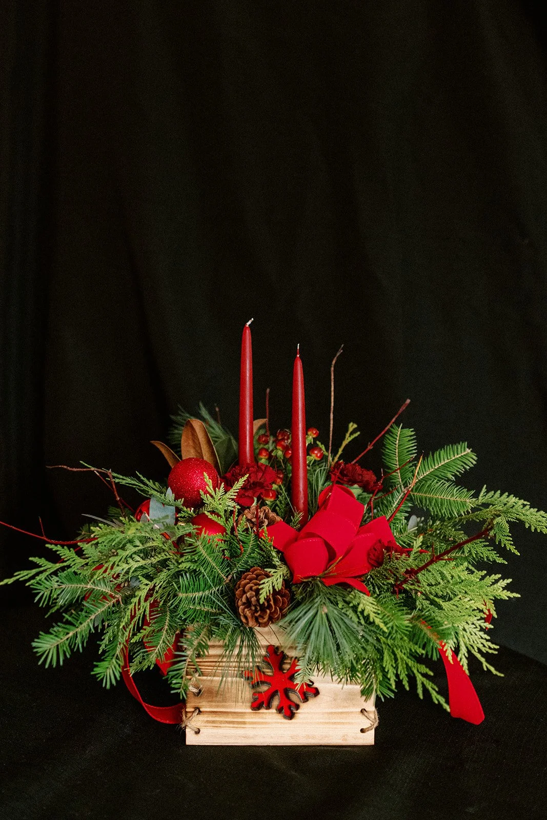 wooden holiday box with candles