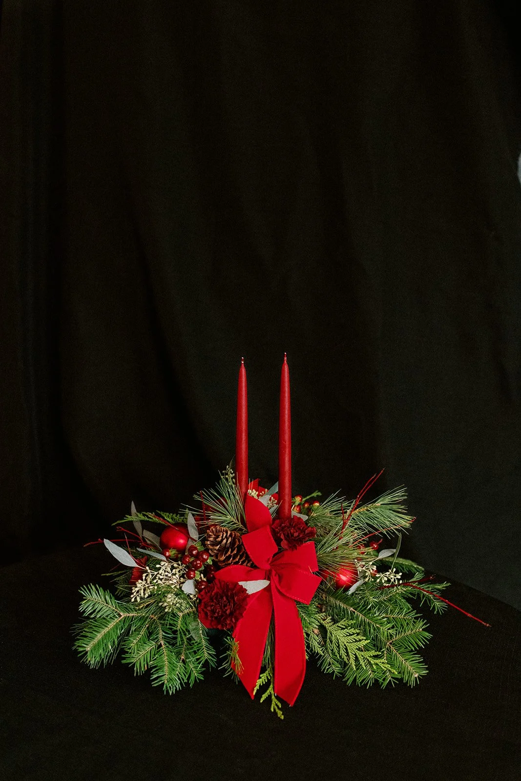 traditional holiday centerpiece with candles
