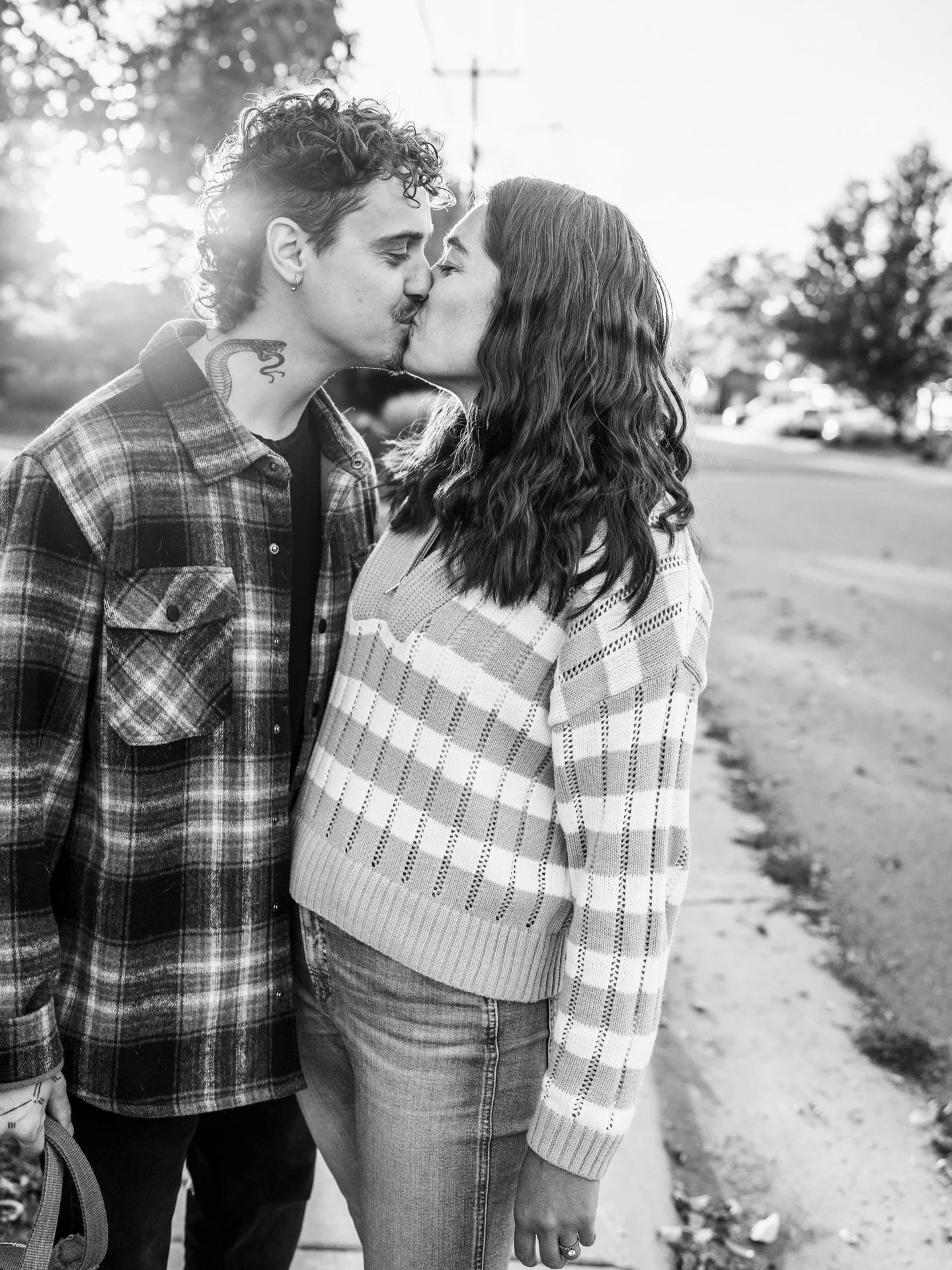 The way you lean into each other on a quiet sidewalk, the softness in your smiles, the comfort of familiar hands finding their place. Even your dog senses it, staying close as part of the story you are building together. Love like this is not staged 