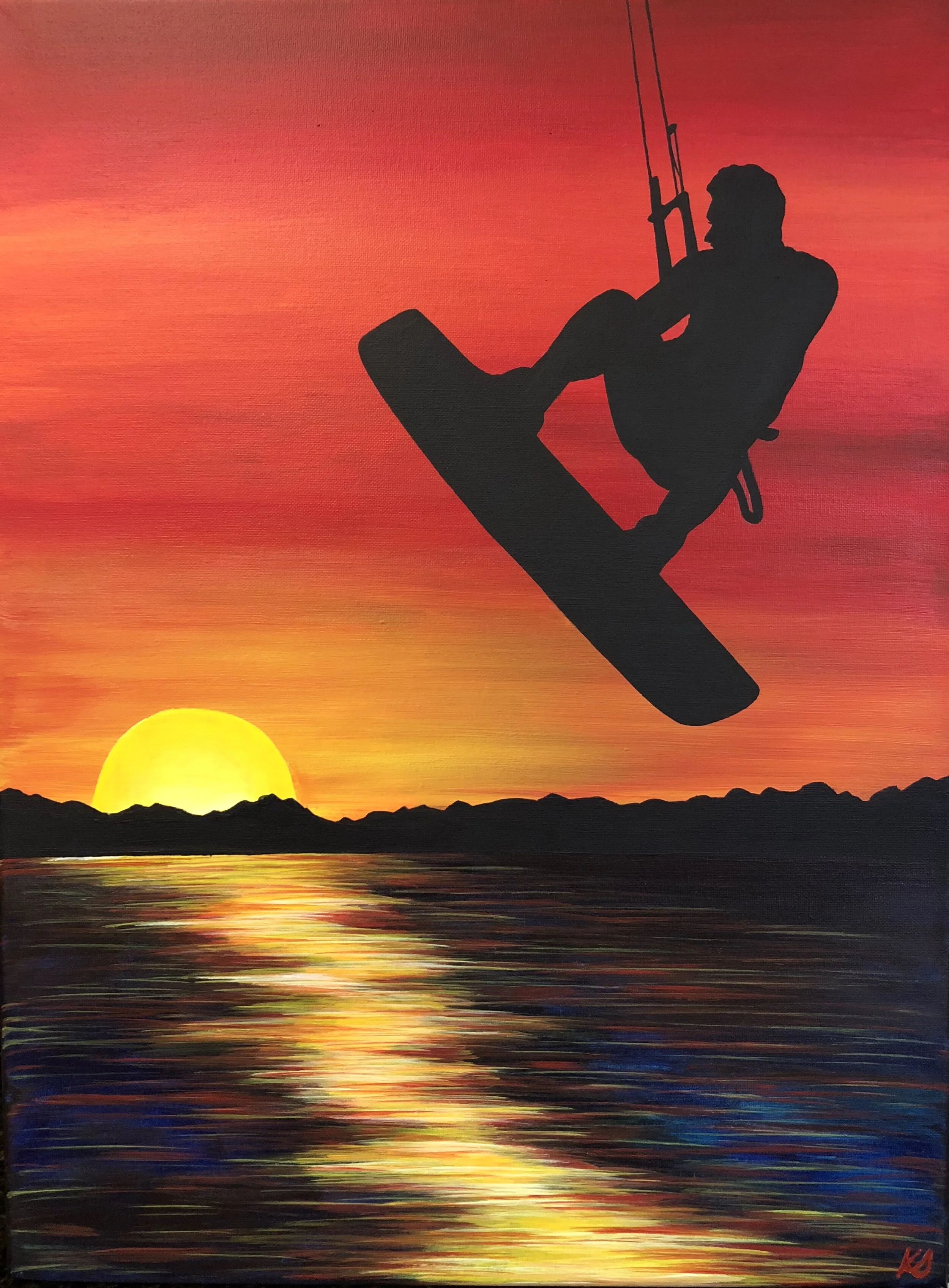 Acrylic painting of a silhouetted kite surfer above the water against a vivid red and orange sunset.