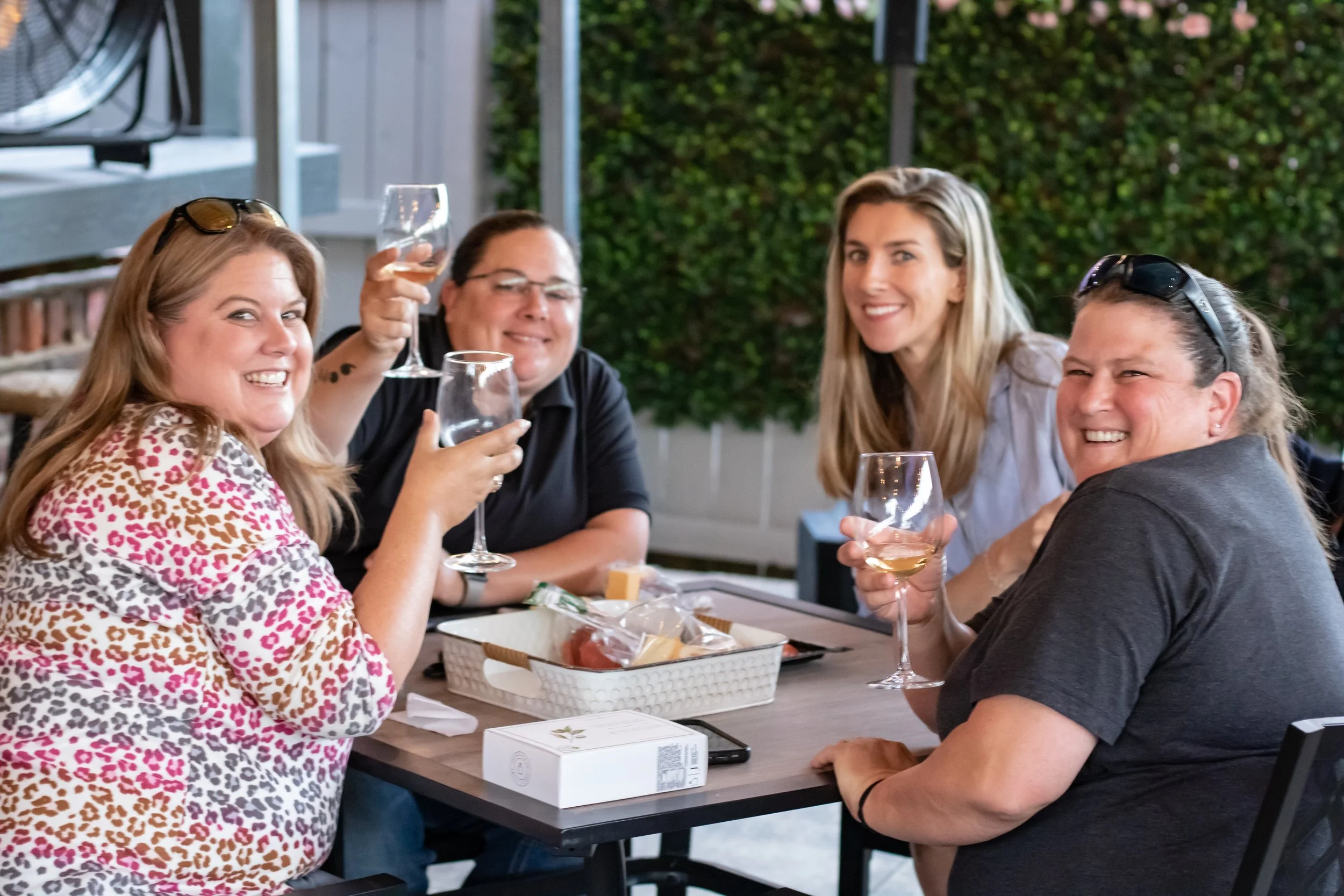 table of woman enjoying wine.jpg