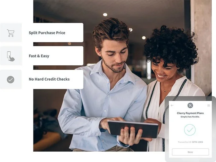 A girl and boy using a tablet, showing something to a girl and having a discussion