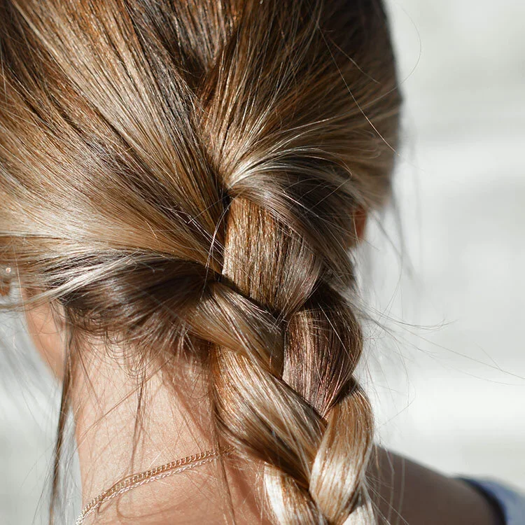 Young woman with a plaited hairstyle