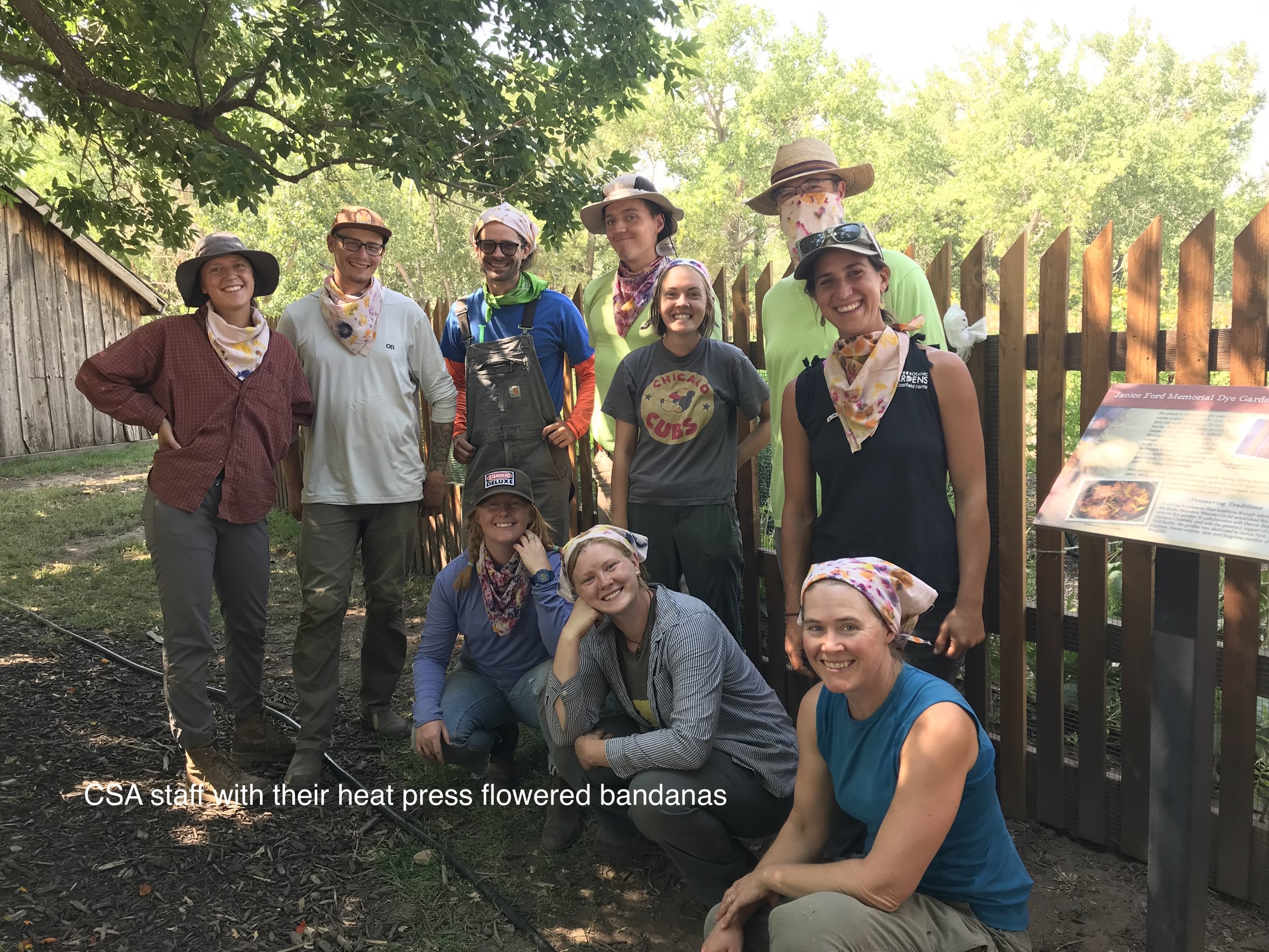 CSA staff with their heat press flower bandanas