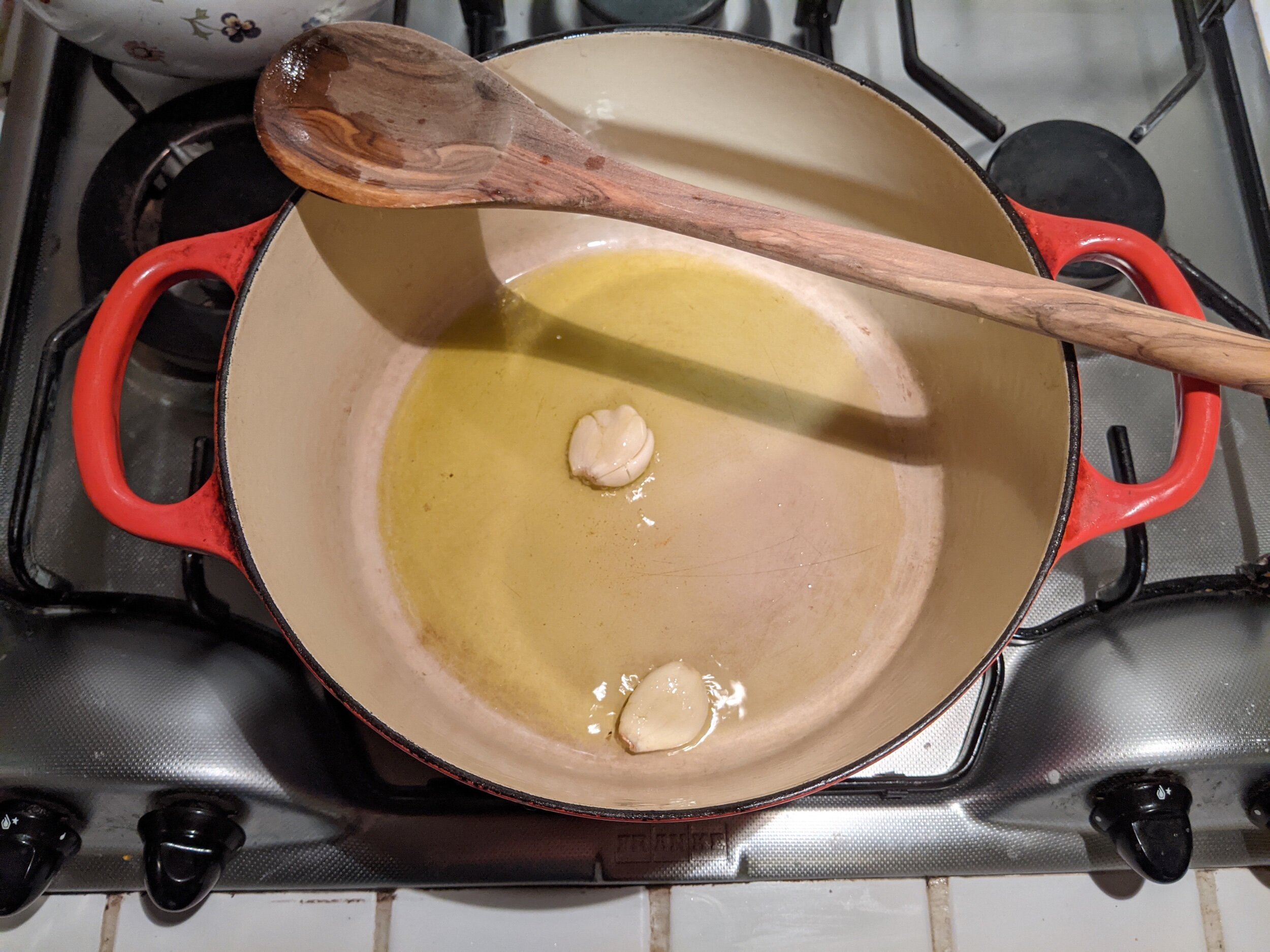 Sauteeing Smashed Garlic Cloves Until Golden