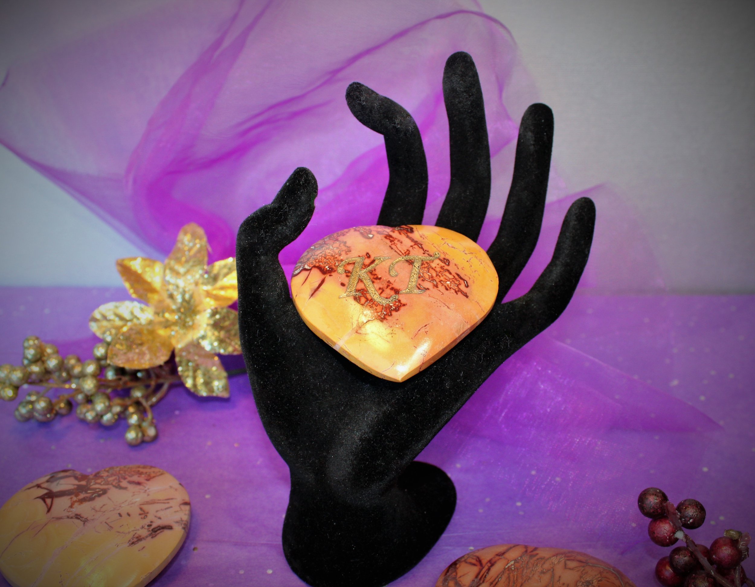 Personalized Mookaite stone heart with natural patterns, capturing ancient wisdom for modern living—ideal for mindful decor or a heartfelt gift.
