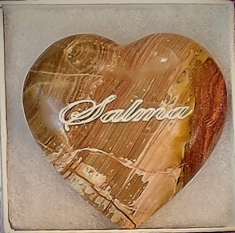 Elegant engraved onyx heart with intricate detailing, perfect for gifting or adding a touch of sophistication to your decor.