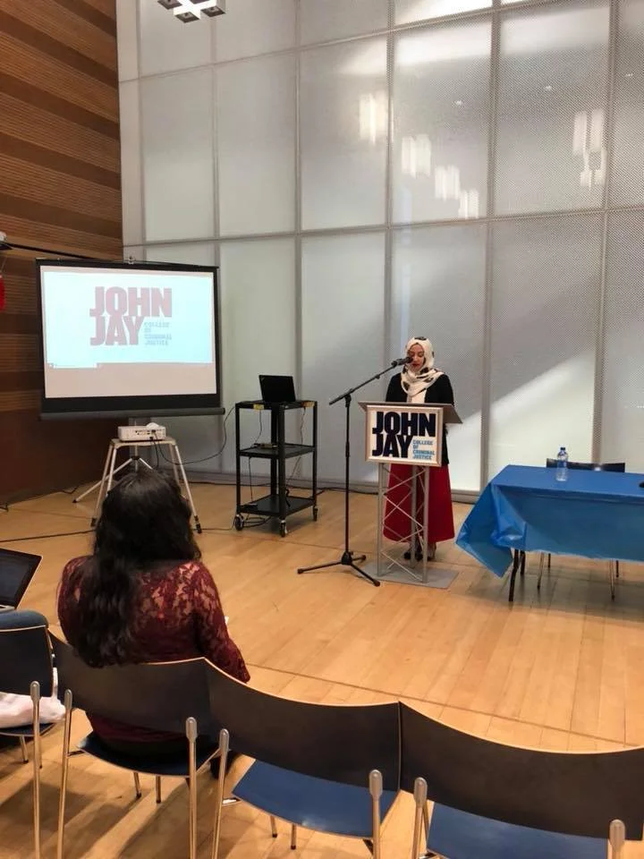 Students presenting at the John Jay Research and Creativity Expo