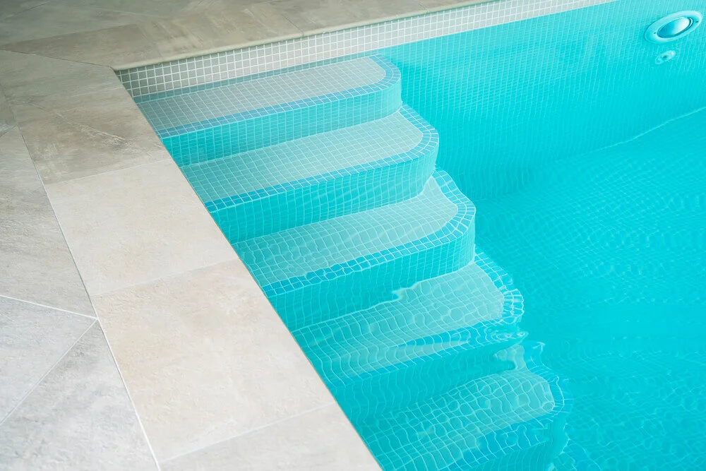 Polar Pools - tiled steps down into a swimming pool.jpg