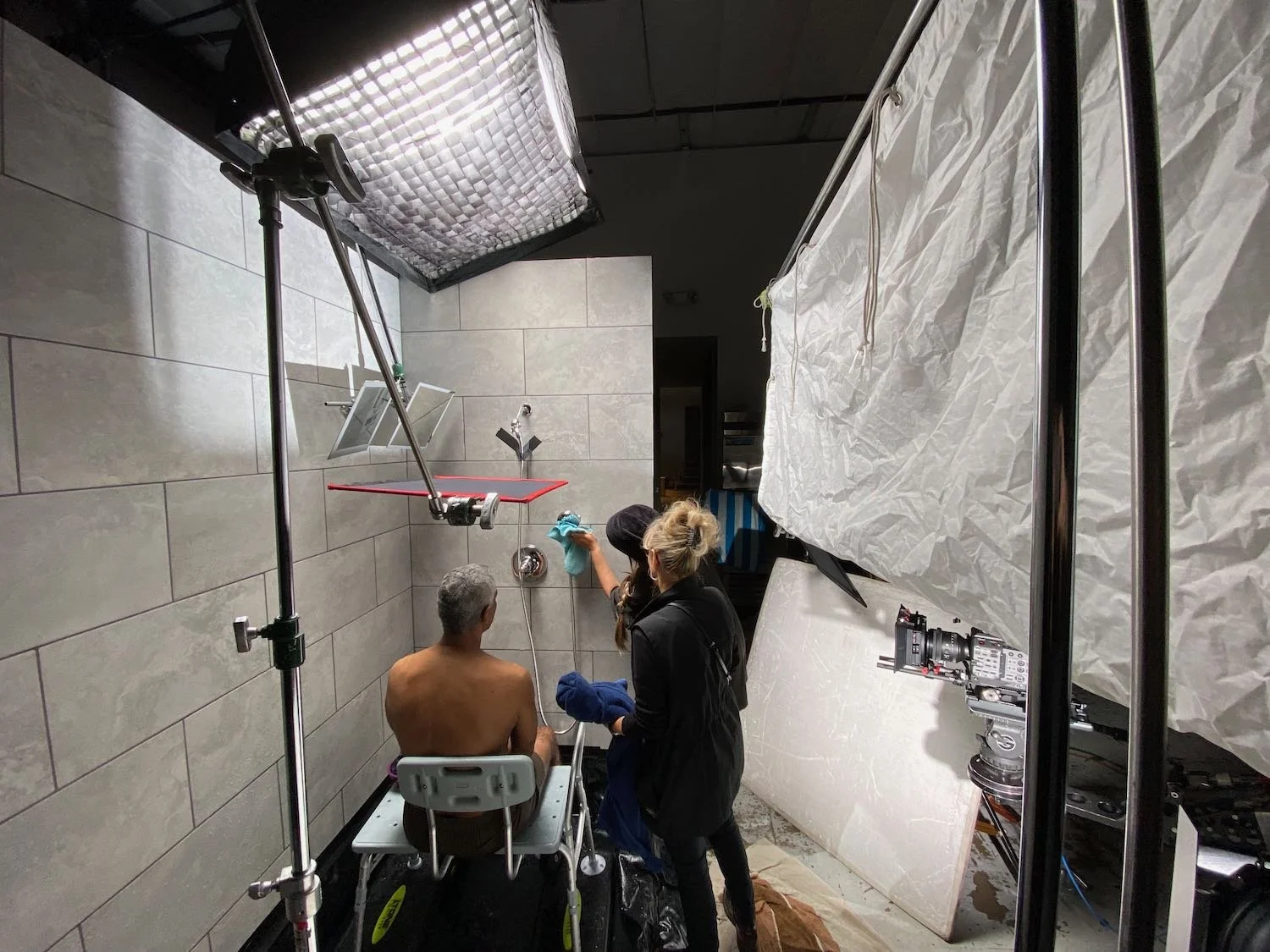 BTS of our shower set - trying to keep the actors warm and the equipment dry!