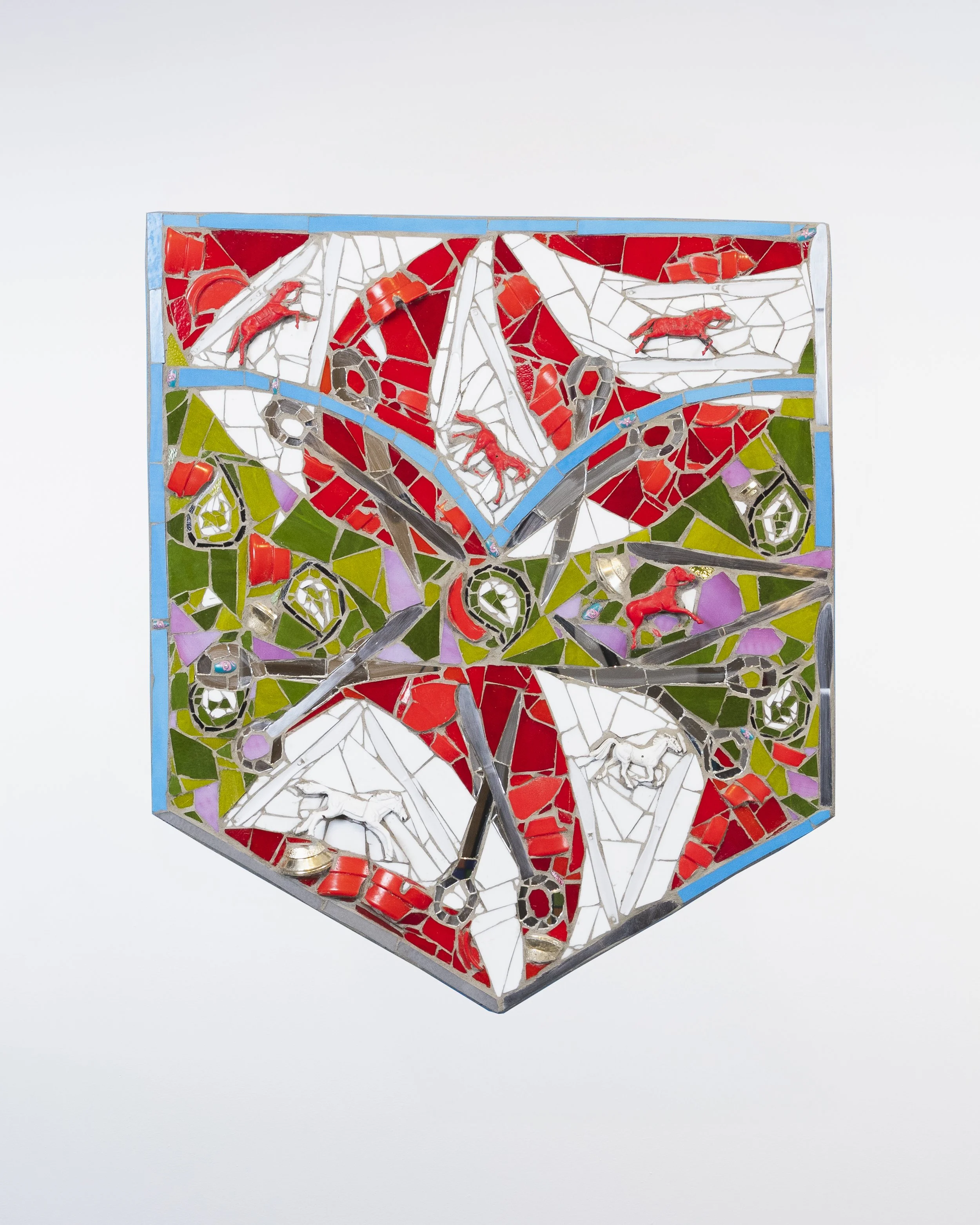 Marco DaSilva, "Peppermint Paisley, "2025, Plastic horses, spray paint, plastic ashtrays, plastic knives, butter knives, broken trophy, acrylic nail set, mirror and mortar on compressed foam board; Barber silhouette painting on wall, house paint, 26.