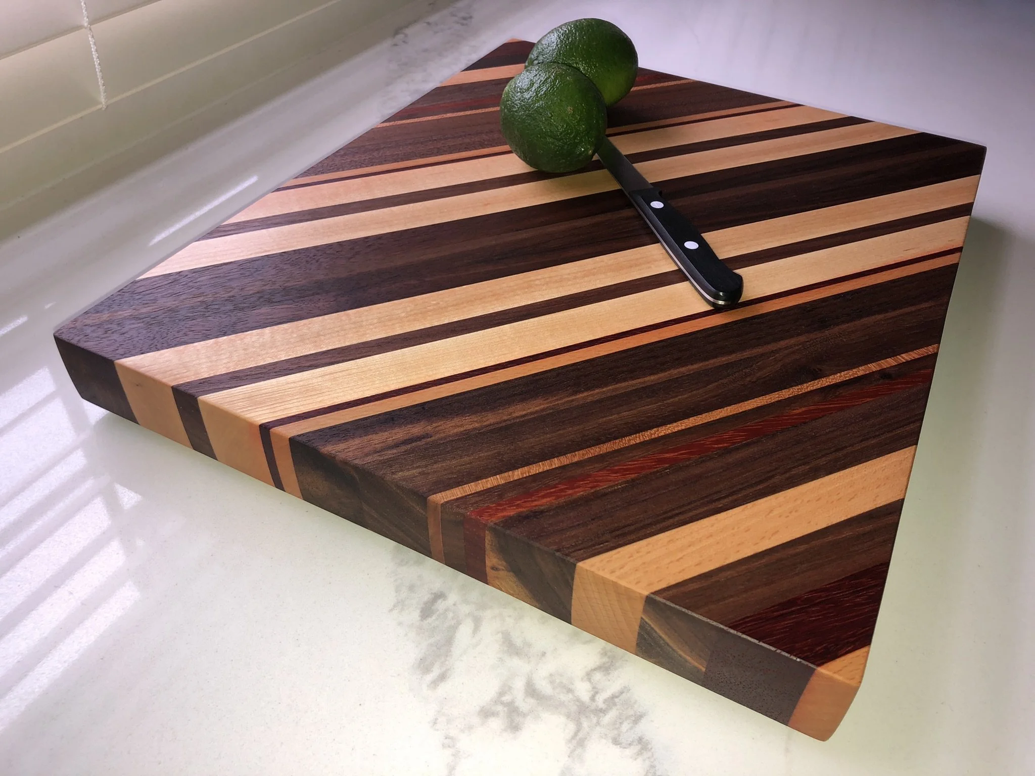 Old World Company: Unnamed: Diagonal stripes of walnut, padauk, cherry, maple, and others.