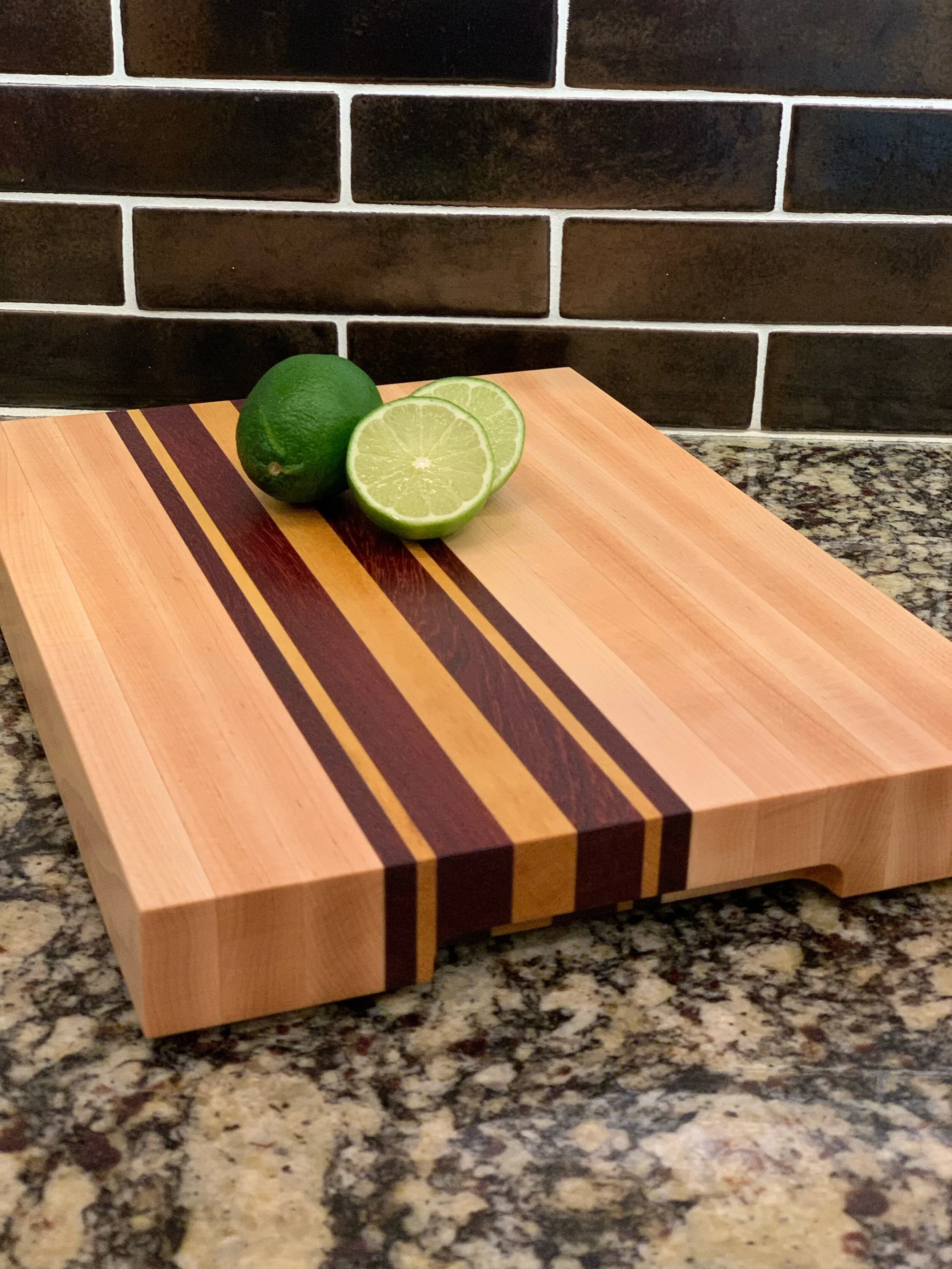 Old World Company: The KC - Maple with strips of padauk and yellow heart.