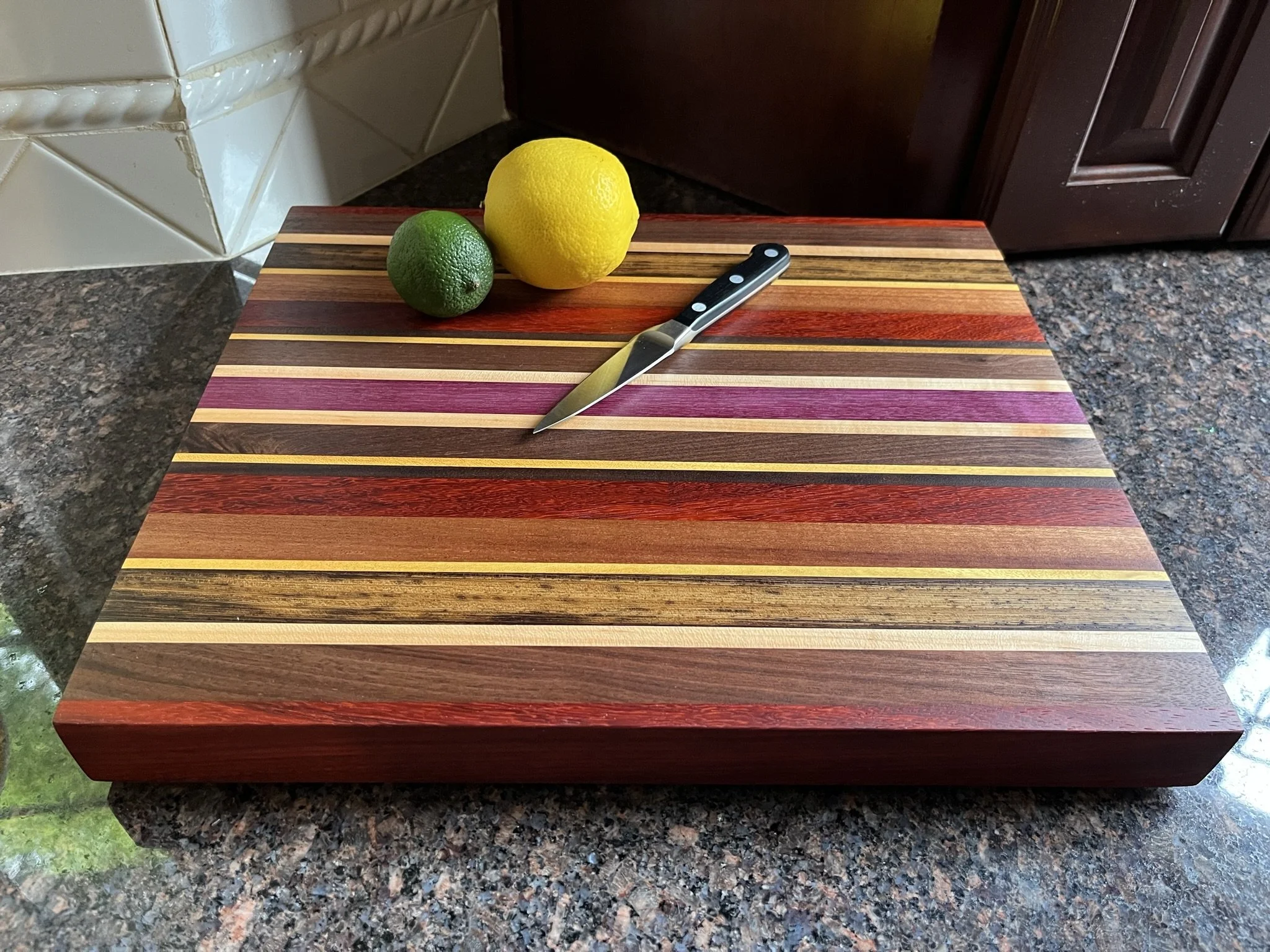 Old World Company: The Vegas - A colorful blend of walnut, wenge, padouk, maple, yellow heart, purple heart, and beech. 